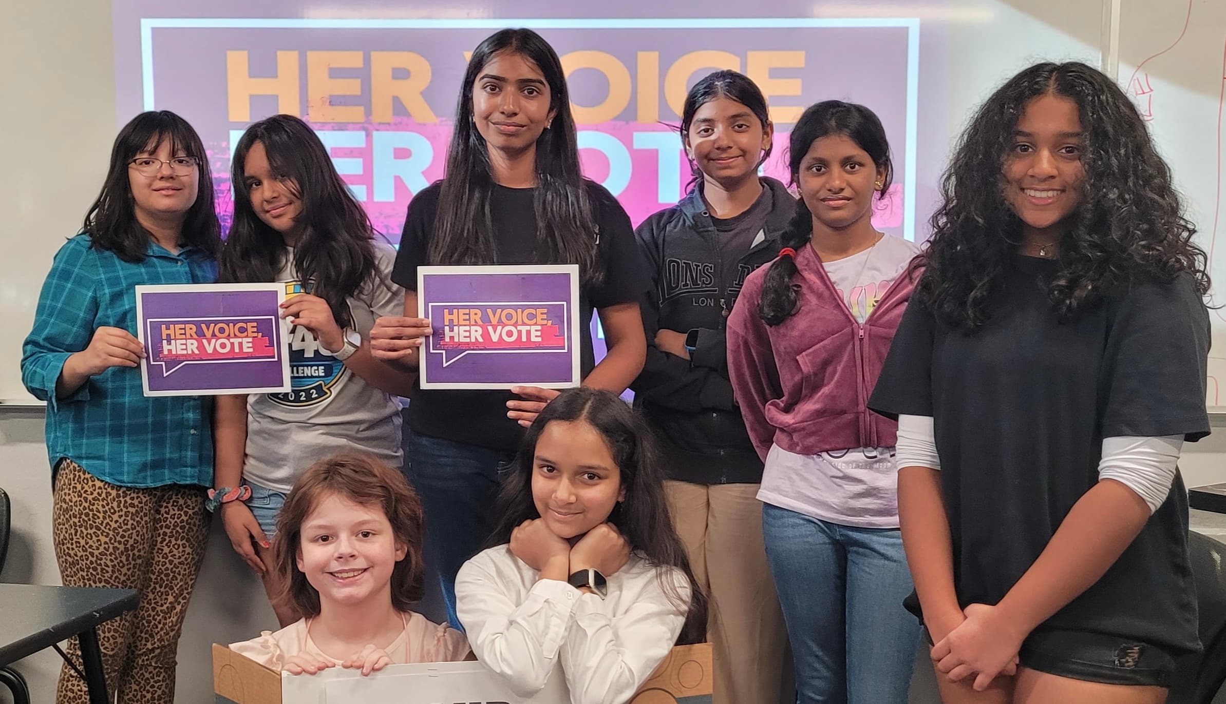 Chapter members at a Her Voice, Her Vote community event