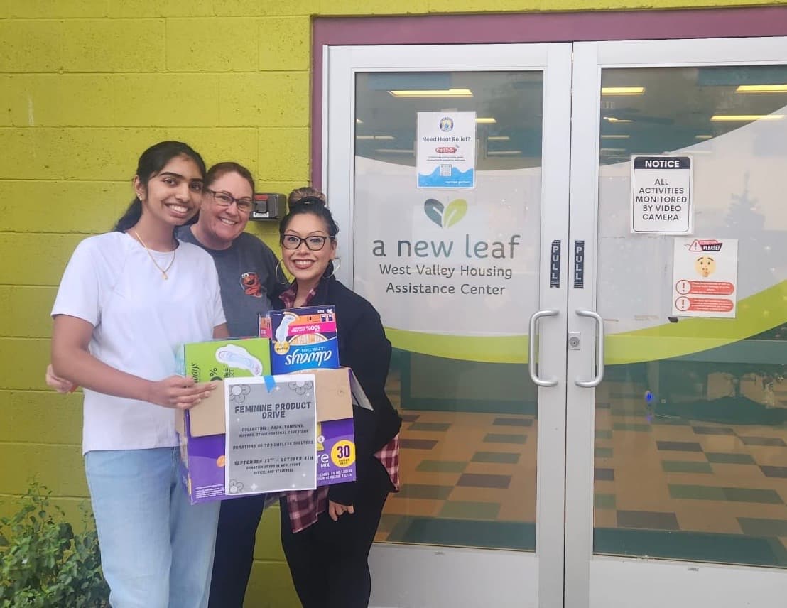 Community members volunteering at a KindredGiving donation event